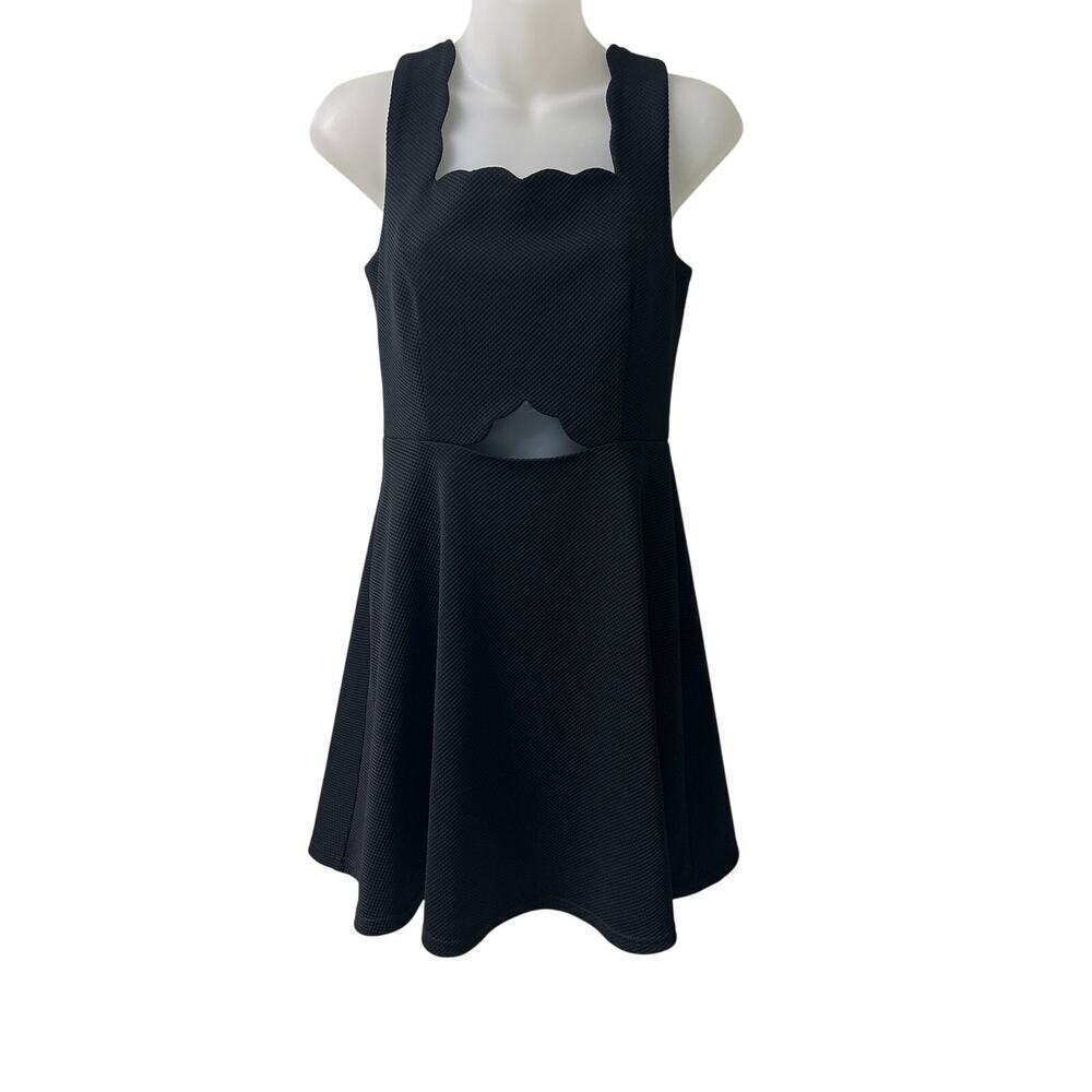 Little Black Dress. Scalloped collar and cutout. Size small, excellent condition